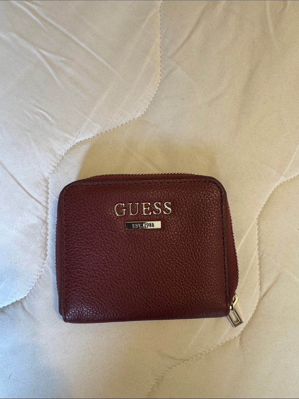 GUESS Burgundy Pebbled Zip Wallet with Gold Logo